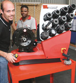 Fluiconnecto’s central warehouse in Gauteng offers a full range of products. Seen here at the hose crimping 
machine is Vaughn Grib with Collen Letsoko